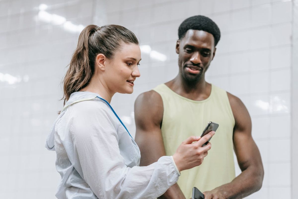 A personal trainer and their client