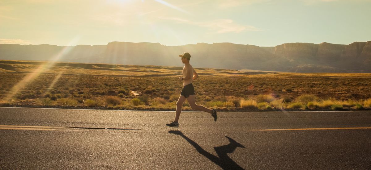 A man enjoying the benefits of strength training for runners.