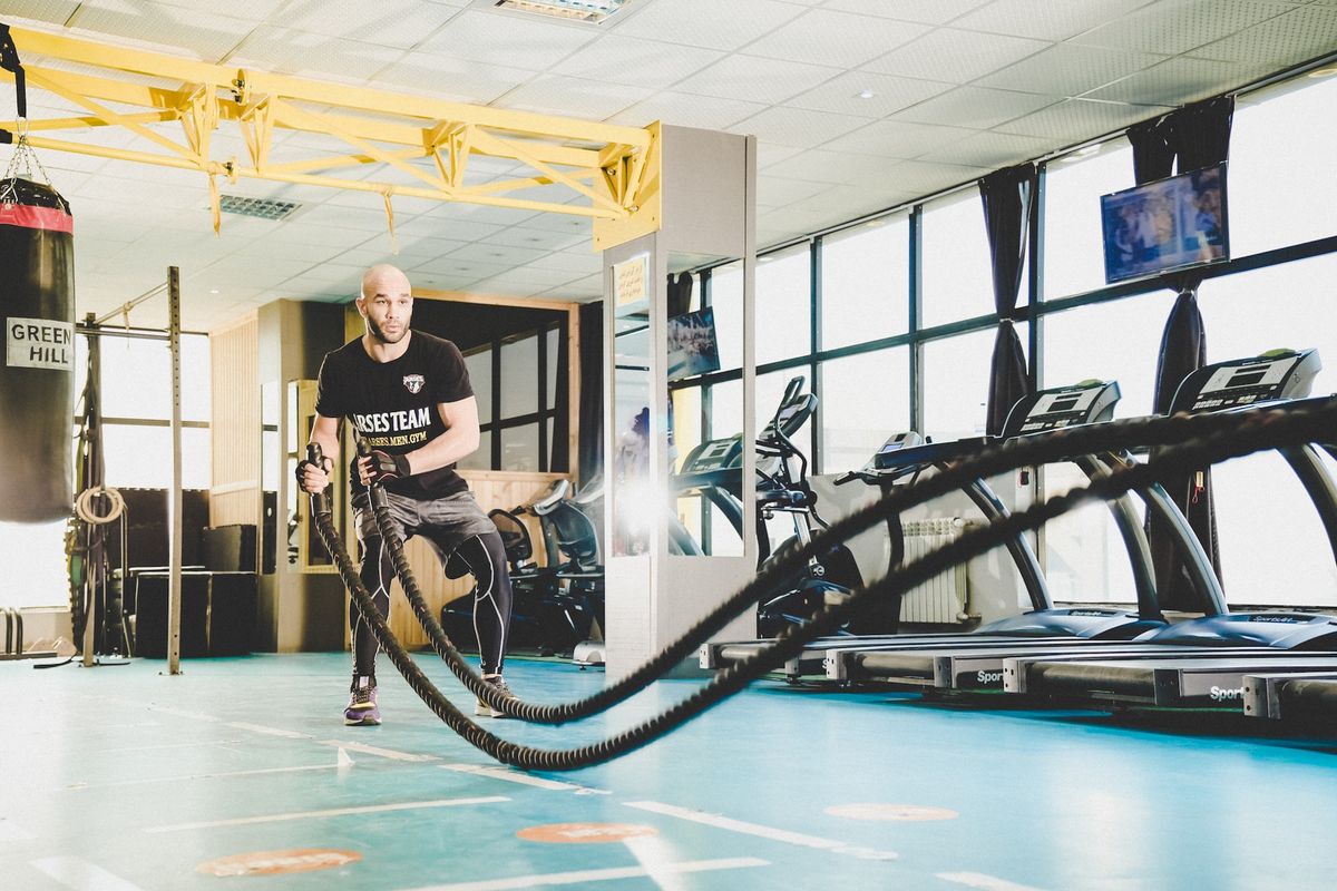 A man completing functional training. 