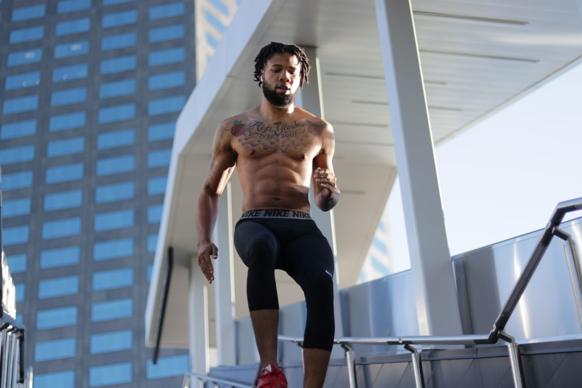 Man completing a weight loss circuit workout. 