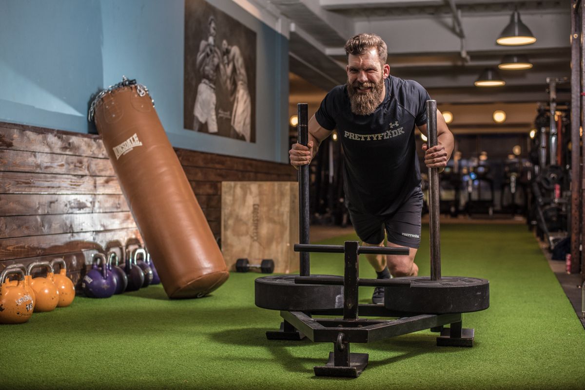 Personal trainer completing a high-intensity interval training (HIIT) workout