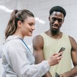 A personal trainer and their client