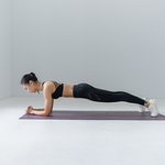 Woman following a bodyweight workout plan for beginners
