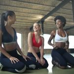 Personal trainers discuss health goals. 