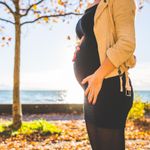 A pregnant woman outside