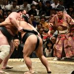 Sumo wrestlers demonstrating their fitness