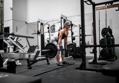 Woman lifting weights.