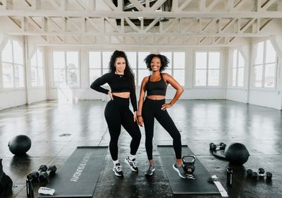 A personal trainer and their client