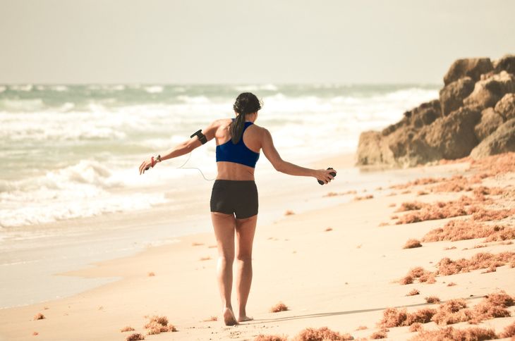 A woman walking on the beach