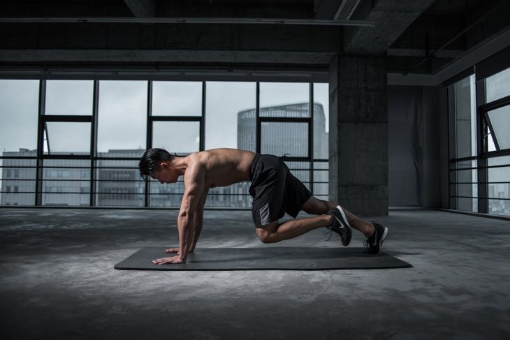 A man doing mountain climbers