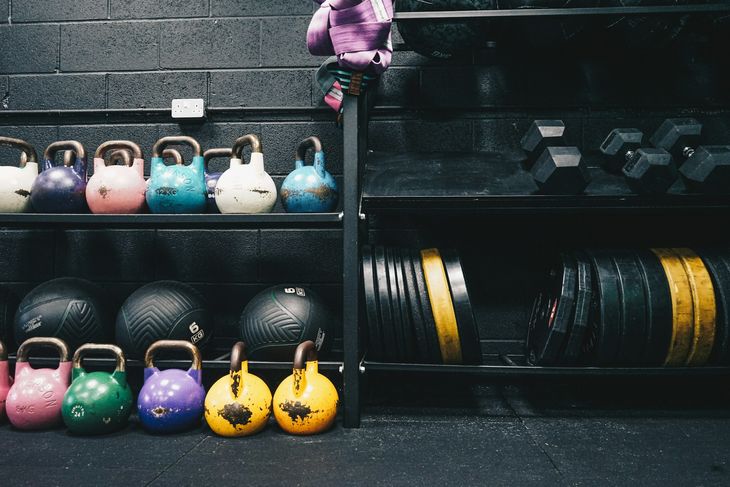Colourful kettlebells in a gym