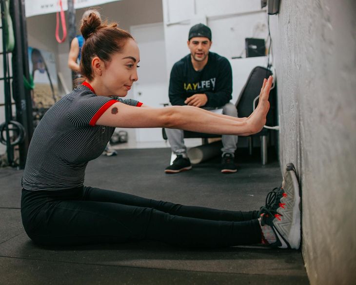 A woman and her personal trainer