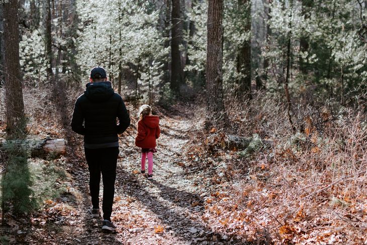 A father and daughter hiking