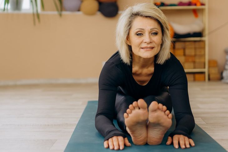 A woman over 60 exercising