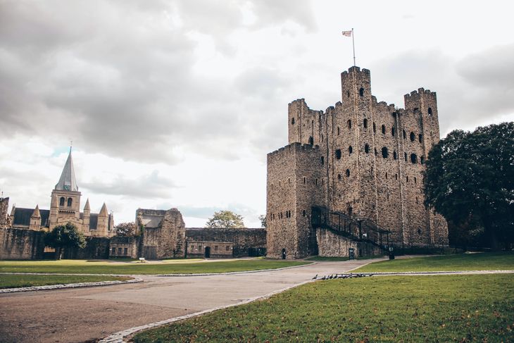 The ground of Rochester castle, a potential place for personal training in Kent.
