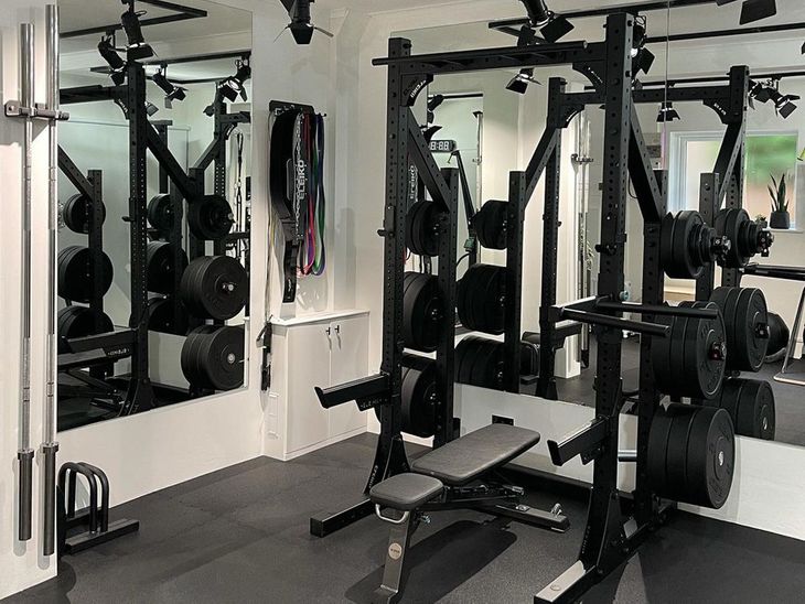 Weights on gym flooring for a home gym. 