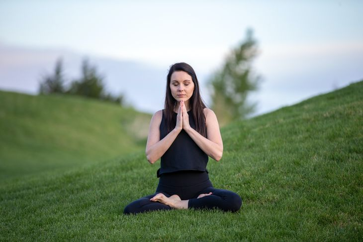 A holistic personal trainer meditating