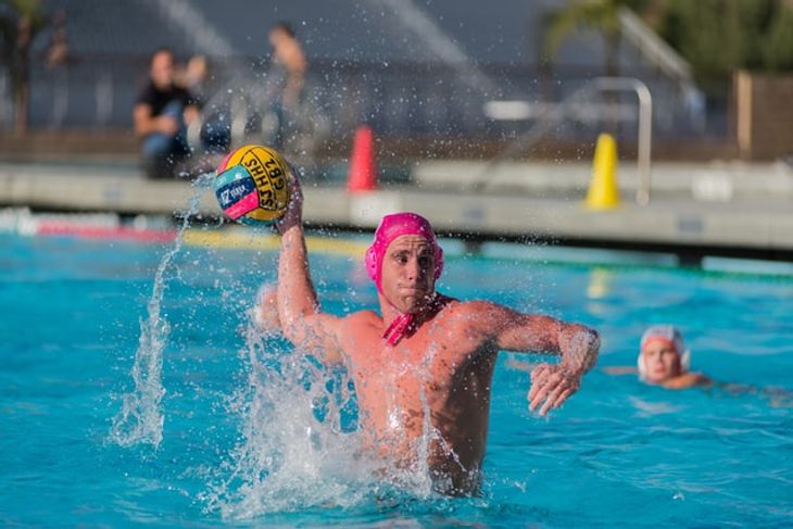 A man playing water polo.